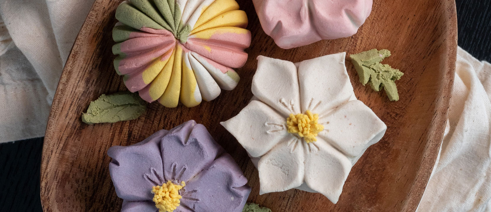 Wagashi, Japanese desserts served on wooden tray.