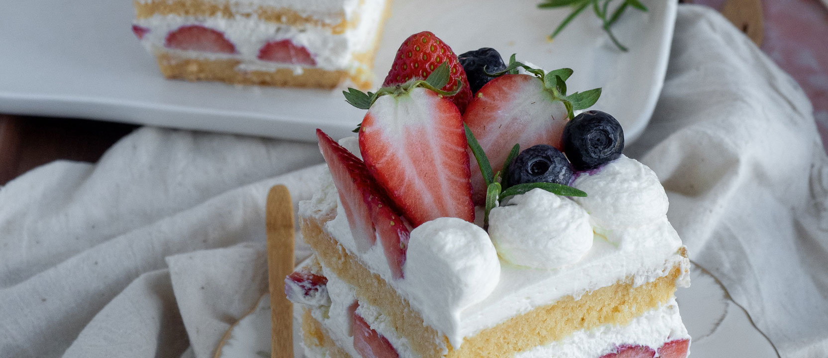Strawberry shortcake served on a floral plate