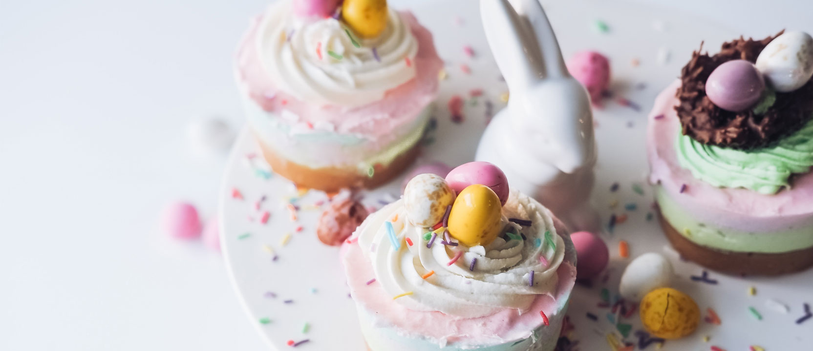Easter cheesecakes served on white, round tray